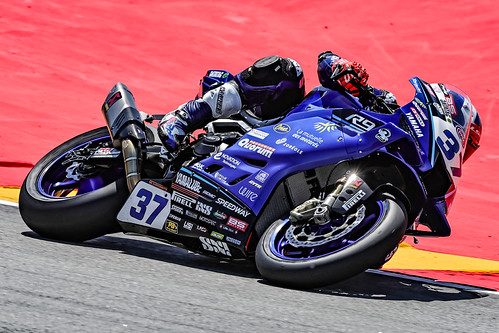 GMT94 race bike leaning through a corner