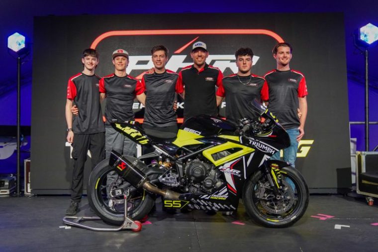 PHR team and riders with their Triumph race bike